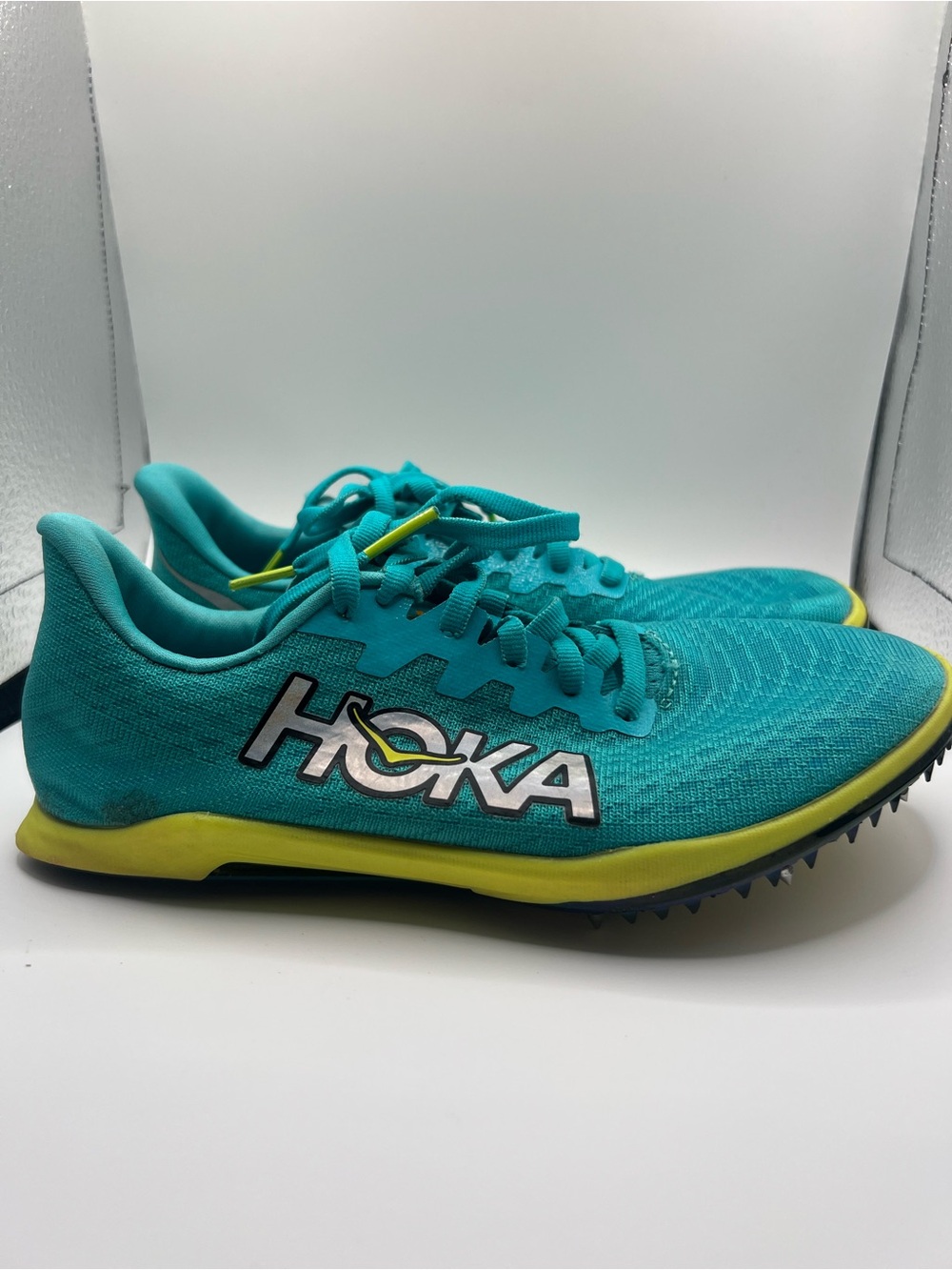 Hoka Teal and Yellow Track Spikes